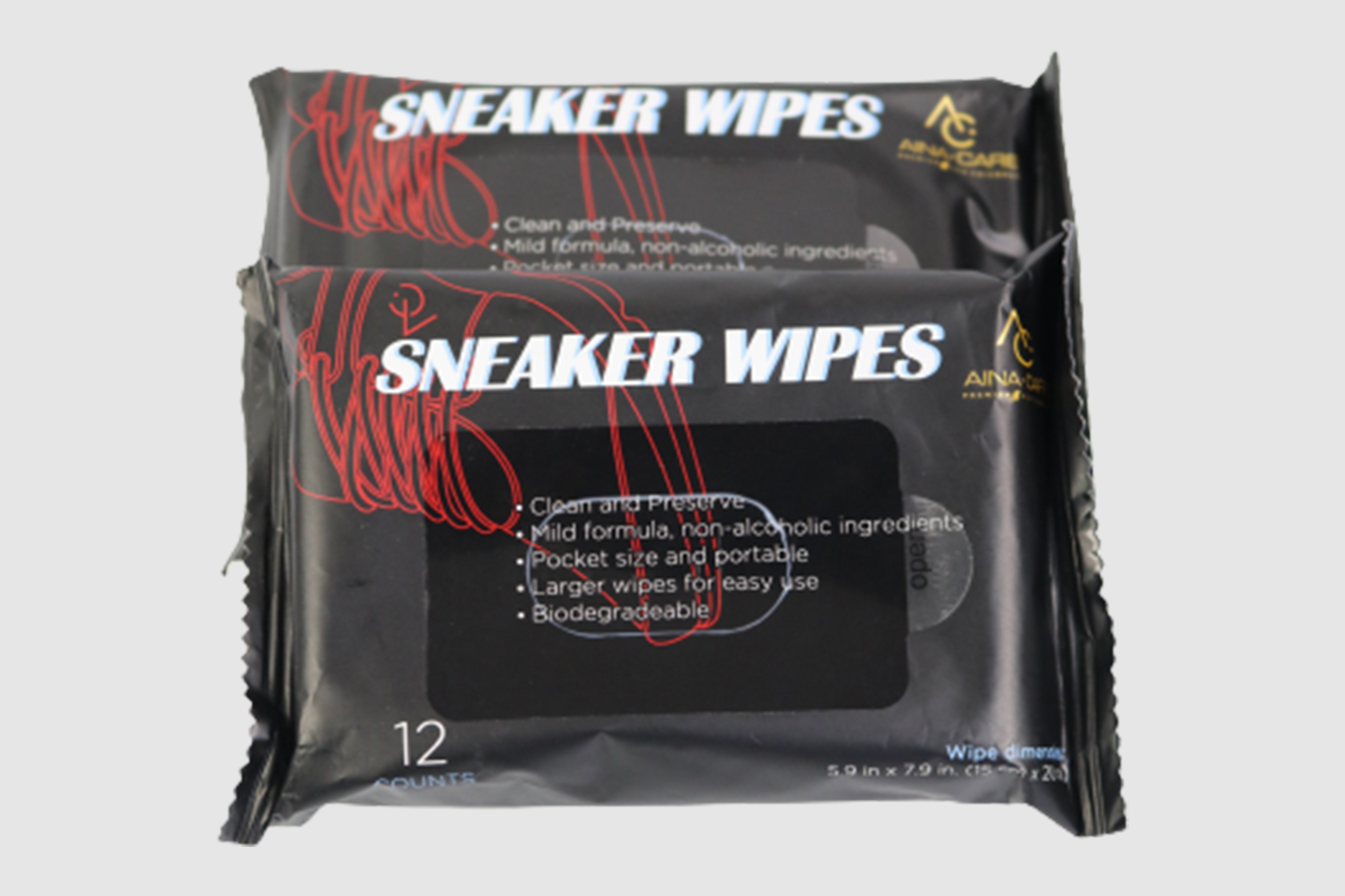 Two packs of All-Purpose Sneaker Wipes from AinaCare on a white background.