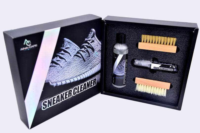 Open kit showing the Signature Sneaker Cleaner bottle, each brush, and the odor eliminator spray to complete the Signature Premium Sneakers Kit from AinaCare.